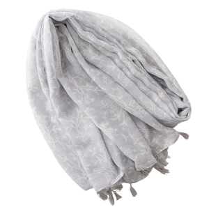 Light gray cotton scarf with white floral print and fringe details for sun protection
