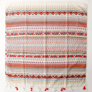 Bohemian geometric print scarf with colorful stripes and decorative red white tassels