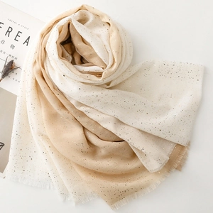 Detail of gradient cotton linen scarf with gold foil dots and delicate fringe edges
