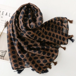 Bohemian leopard print scarf with colorful tassels, elegant earthy tones pashmina wrap