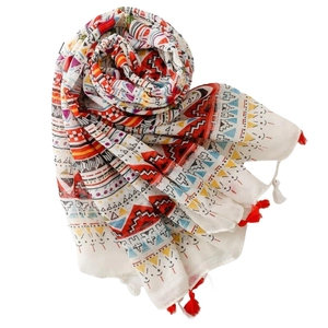 Ethnic geometric print voile scarf with colorful floral patterns and red tassel edges