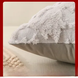 Macro shot of plush feather texture and double-sided stitching on gray Christmas pillow cover