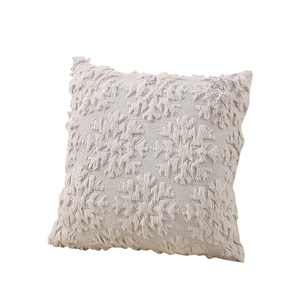 Minimalist square plush Christmas pillow cover with embroidered snowflake pattern on beige fabric