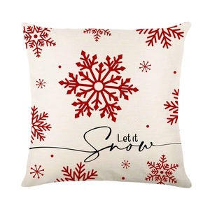 Festive Let it Snow Christmas pillow case with red snowflake patterns on linen fabric