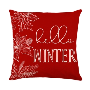 Red Christmas pillow cover with white Hello Winter lettering and snowflake pinecone patterns