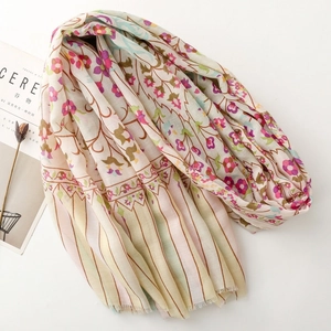 Floral stripe cotton scarf with soft fringe edges and light pastel flower prints