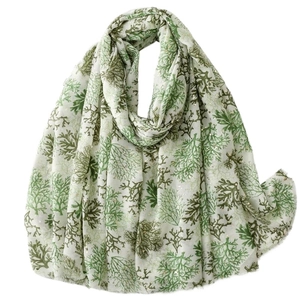 White linen-feel scarf with green coral reef prints and gold foil accents for women