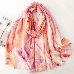 Artistic marble print scarf in pink and purple with fringe edges and cotton-linen texture