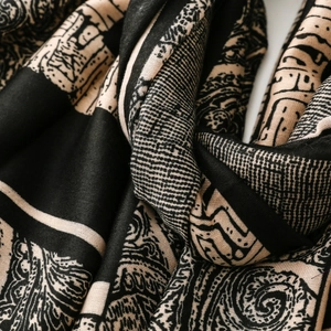 Close-up of vintage paisley geometric pattern on soft cotton linen pashmina shawl scarf