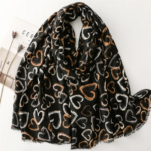 Lightweight black scarf with colorful heart print and frayed edges for women's autumn wear