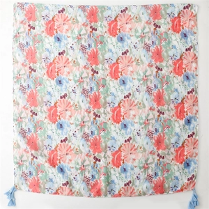 Thick soft scarf with pink and blue floral print and fringe tassels for travel