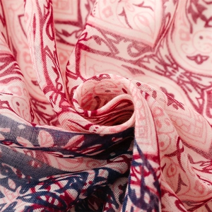 Close-up of bohemian mandala print scarf showing soft chiffon fabric texture and fringe