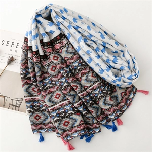 Ethnic style scarf with elephant and geometric patterns featuring colorful tassels