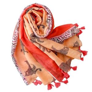 Lightweight leopard and zebra print shawl with red tassels in a heart shape