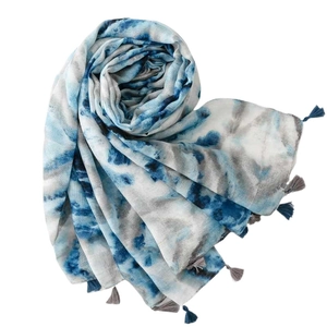 Blue and grey tie-dye cotton scarf with matching fringe tassels on white background