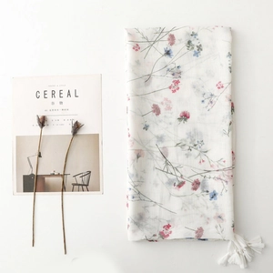 Lightweight white floral scarf with small prints and fringes for spring and summer