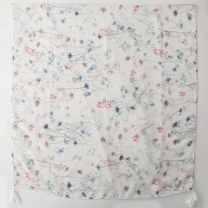 White floral cotton scarf with small pink flowers and elegant tassels on edges