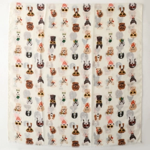 Flat lay of cream silk scarf featuring cute cartoon dogs wearing sunglasses and hats