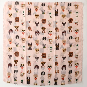 Close-up of pink lightweight scarf featuring cute cartoon dogs wearing sunglasses and bowties