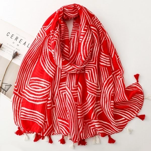 Minimalist red and white geometric scarf with tassels and breathable linen-feel fabric
