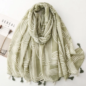 Grass green linen-feel scarf with minimalist white lines and fringe details