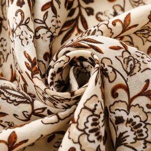 Close-up of thick autumn cotton linen shawl with vintage floral print and fabric texture