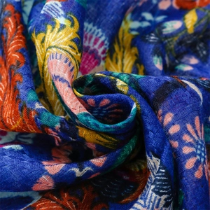 Close-up of vintage paisley floral pattern and textured weave on heavy cotton linen scarf