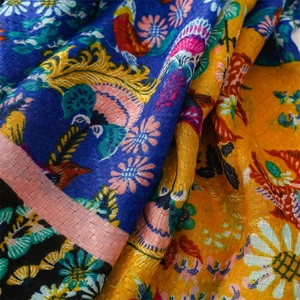 Close-up of retro floral and bird print on linen texture thick cotton shawl scarf