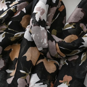 Close-up of elegant cotton-linen feel shawl featuring realistic rose floral patterns