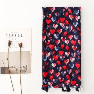 Navy blue cotton-linen scarf with red heart prints and decorative fringed tassels