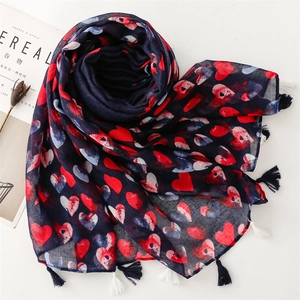 Navy blue cotton linen scarf with red heart patterns and tassels on white background