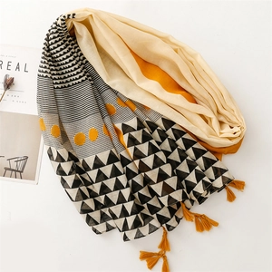 Linen feel scarf with yellow tassels and geometric patterns for sun protection