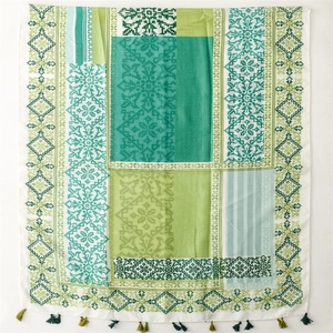 Bohemian green geometric shawl with silver silk and fringe trim for vacation travel