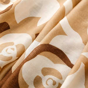Macro view of khaki camellia pattern on soft linen-feel fabric with natural drapes