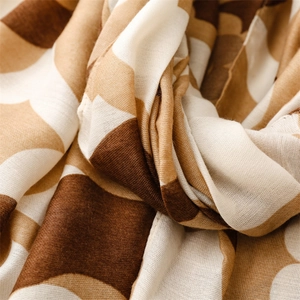 Close-up of wavy geometric pattern on thick cotton-linen blend winter scarf shawl
