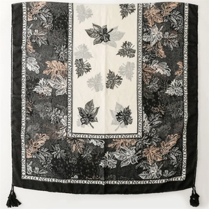 Artistic leaf print linen-feel shawl with YES and NO text borders and black corner tassels