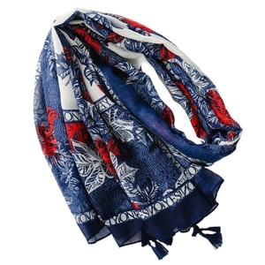 Navy and red cotton-linen feel scarf with tropical leaf prints and tassel fringe