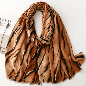 Linen feel gradient zebra print shawl with gold foil accents and fringe edges for women