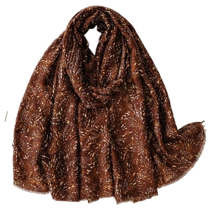 Caramel brown scarf with feather print and fringe edges on a clean white background