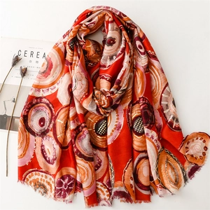 Artistic red cotton linen scarf with colorful geometric bubble patterns and fringe trim