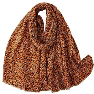 Vibrant orange leopard print scarf with fringed edges and soft cotton-linen feel