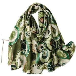 Artistic green geometric cotton linen scarf with abstract gold circles and fringe