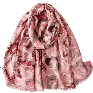 Écharpe en coton et lin rose avec motifs ondulés dorés et imprimé floral abstrait