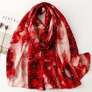 Artistic red and white gradient scarf with gold glitter accents for women's winter fashion