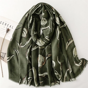 Artistic dark green shawl scarf featuring white tulip prints and subtle gold foil accents