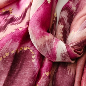 Detail of cotton-linen scarf with gold heart foil print and wavy gradient texture