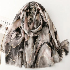 Linen feel scarf with gold foil mountain waves and fringe in gray and pink