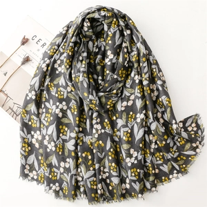 Dark grey cotton linen scarf with yellow and white floral print and tassel edges
