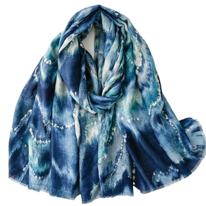 Blue and white gradient cotton linen scarf with gold foil accents and fringe