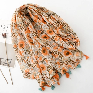 Floral cotton scarf with orange blossoms, dark green leaves and colorful tassels
